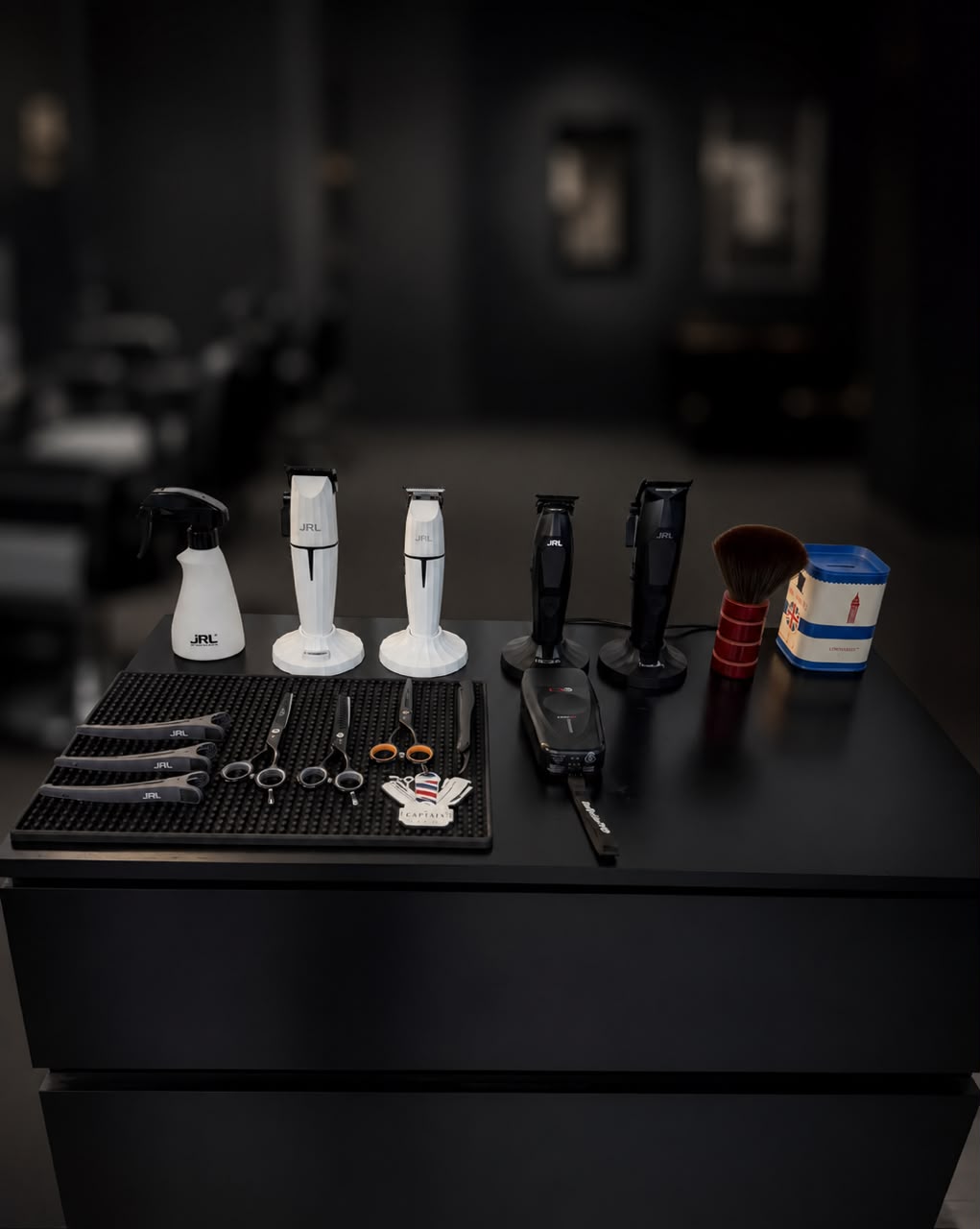 Alpha Fades tools and clippers arranged on the counter